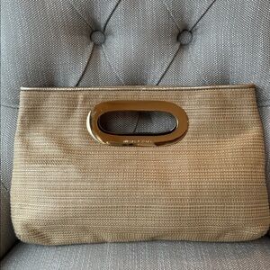 Michael Kors straw and gold clutch. Perfect for spring break and summer!